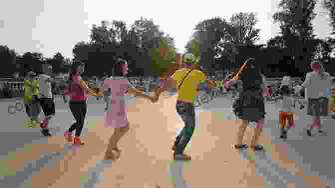 A Group Of People Dancing In A Circle, Holding Hands Circle Dance Dancing The Sacred Way