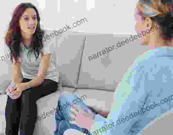 A Therapist Sitting With A Client, Both Looking Pensive And Engaged In Conversation One Nation Under Therapy: How The Helping Culture Is Eroding Self Reliance