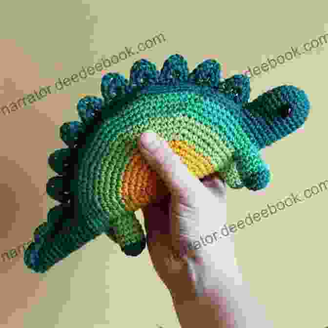 Crocheted Stegosaurus Amigurumi With Colorful Plates And A Long Spiky Tail Amigurumi Dinosaur Tutorials: Crochet Cute Dinosaurs Patterns For Beginners: Crochet Dinosaurs Tutorials