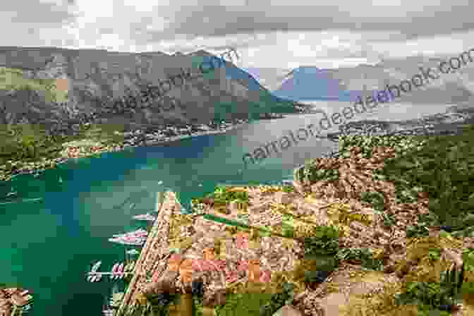 Panoramic View Of Kotor Bay With Mountains And The Town Of Kotor In The Background Montenegro Coast In 7 Days (Travel Guide 2024):Best Things To Do In The Montenegro Coast: What To See Do Where To Stay Eat Online Maps 7 Day Itinerary Best Tips For First Time Visitors To Montenegro